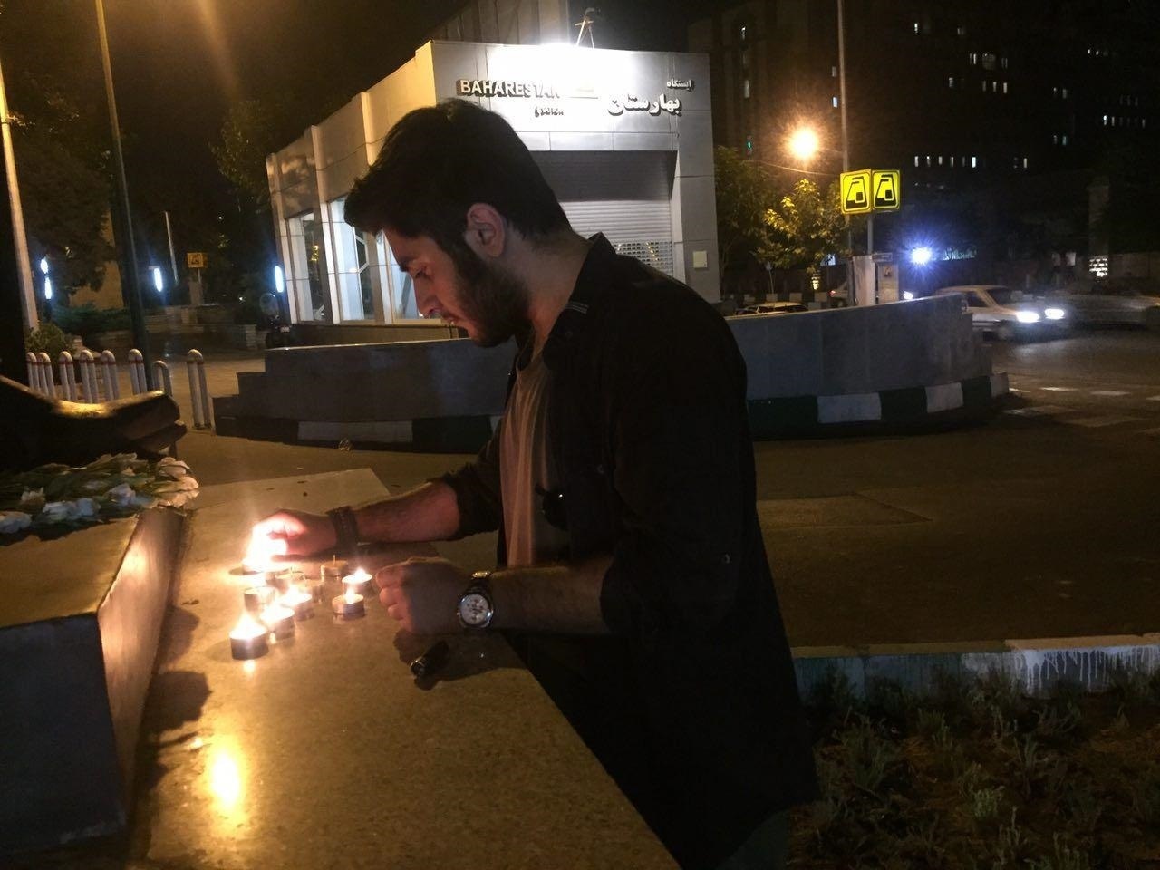 روشن‌کردن شمع به یاد قربانیان حملات تروریستی تهران +عکس